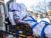 Video: Accused parent killer rushed to hospital in chains