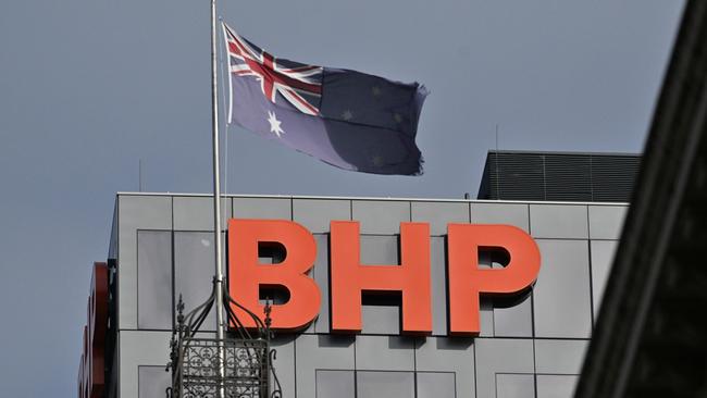 ADELAIDE, AUSTRALIA - NewsWire Photos APRIL 17, 2024: The old Adelaide GPO clock tower on the corner of King William St and Franklin St, now part of the Marriott hotel. With BHP signage. Picture: NCA NewsWire / Brenton Edwards