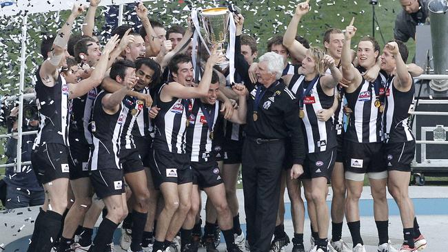 Collingwood players celebrate winning the 2010 Grand Final.