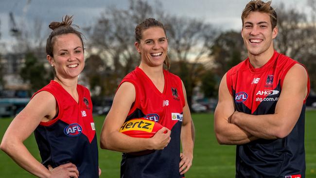 Daisy Pearce (left) and Chelsea Randall (centre) with Jack Viney in 2015.