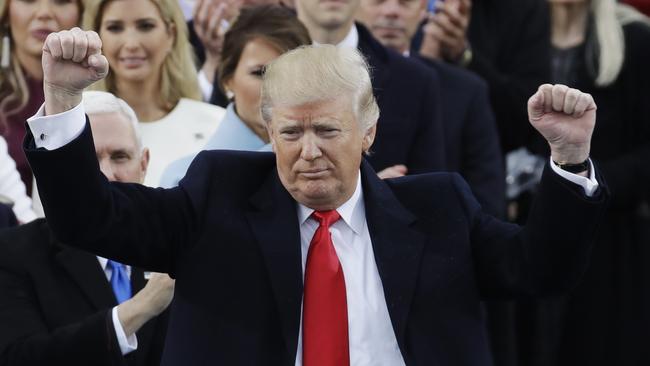 President Donald Trump pumps his fist after delivering his inaugural address after being sworn in as the 45th president of the United States during the 58th Presidential Inauguration at the U.S. Capitol in Washington, Friday, Jan. 20, 2017. (AP Photo/Patrick Semansky)