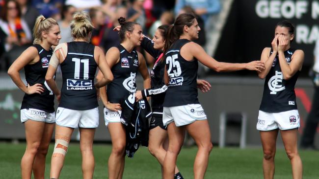 Carlton players come to terms with their side’s grand final loss to Adelaide. Picture: AAP Image/Kelly Barnes.