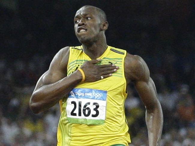 Usain Bolt celebrates winning Olympic gold in the 100m final at the 2008 Beijing Olympics. Picture: AP