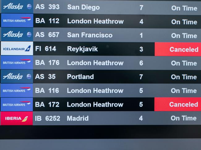 An information screen lists multiple cancelled flights at Terminal 7 of John F. Kennedy International Airport on December 24, 2021. Picture: AFP