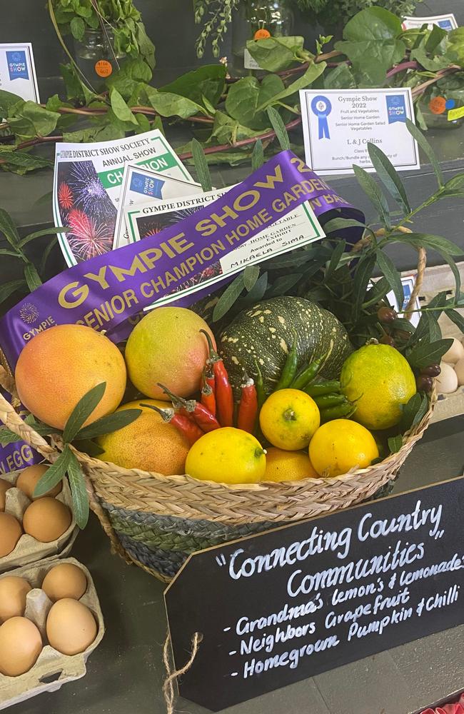 Mikaela Sima took home grand champion for her display of fruit and veg, named "connecting country communities", on day two of the Gympie show.