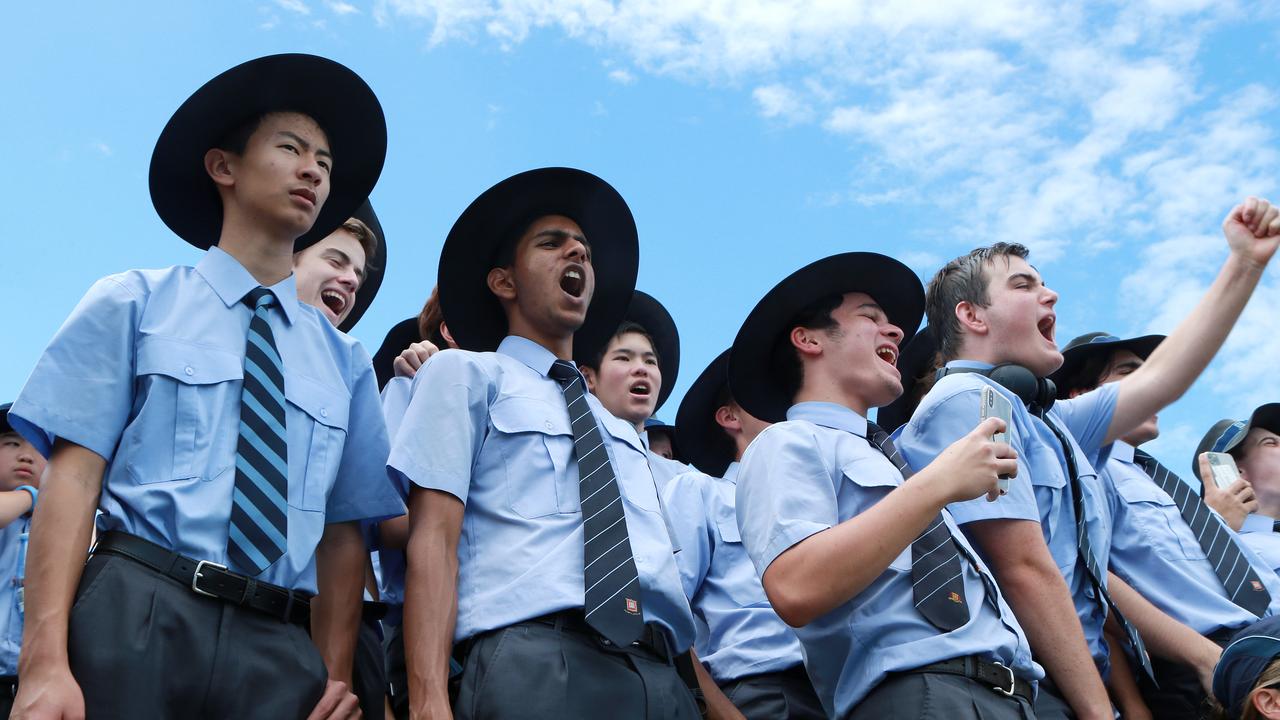 Brisbane Grammar school students cheer their winning team at the GPS Head of the River, Lake Wyaralong. Picture: Sarah Marshall/AAP