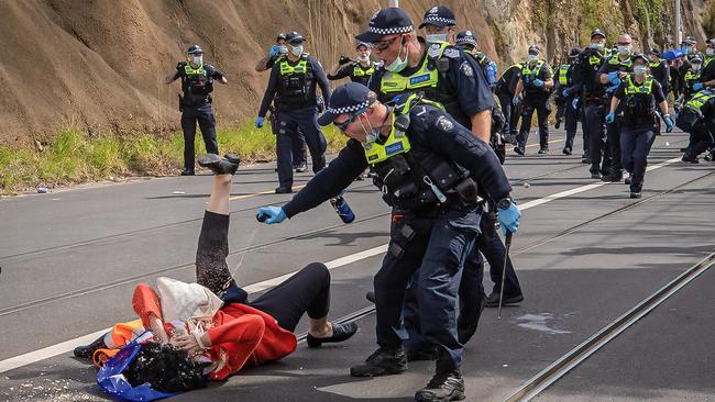 A protester is pepper-sprayed in Melbourne in 2021. Picture: Jason Edwards