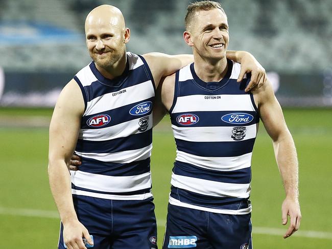 Gary Ablett and Joel Selwood walk off together after playing their 350th and 300th games respectively. Picture: Getty Images