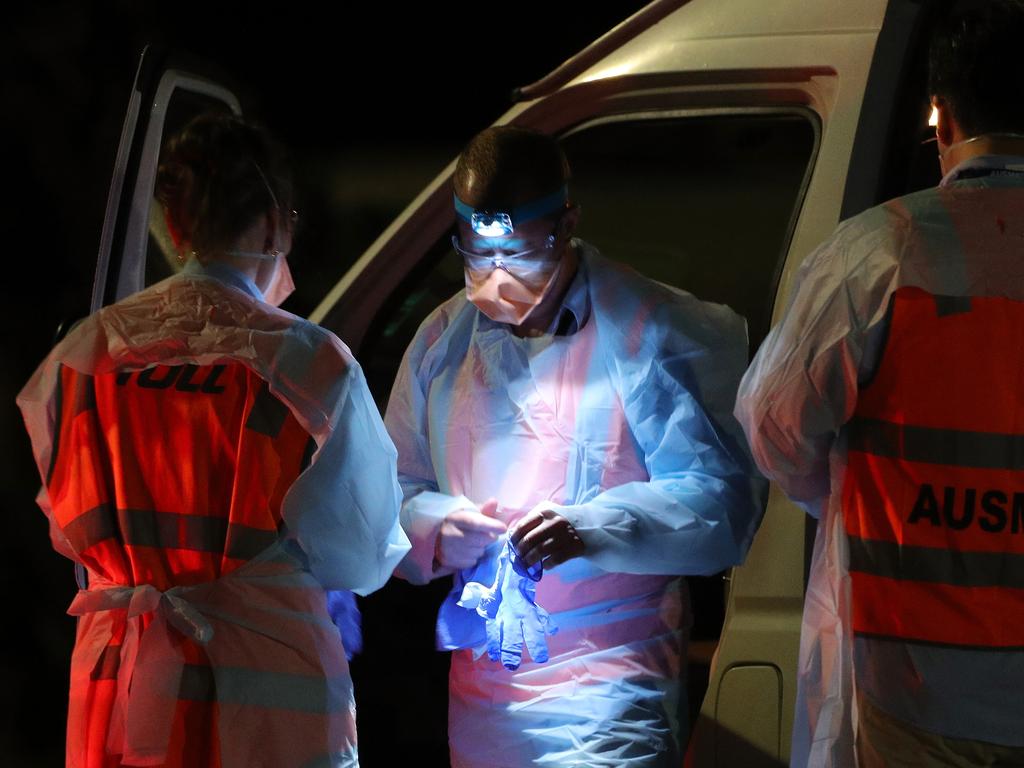 AUSMAT staff prepare for the arrival of an Australian evacuee flight on Christmas Island this week. Picture: AAP Image/Richard Wainwright