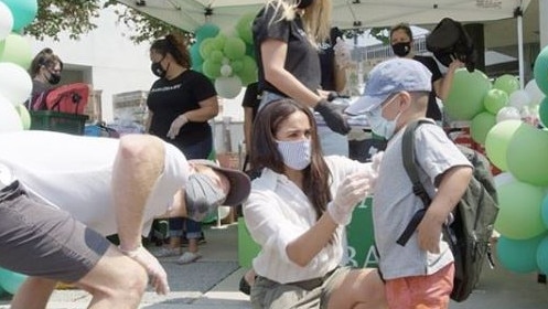 Meghan Markle and Prince Harry volunteer at a school charity drive in Los Angeles. Picture: Instagram