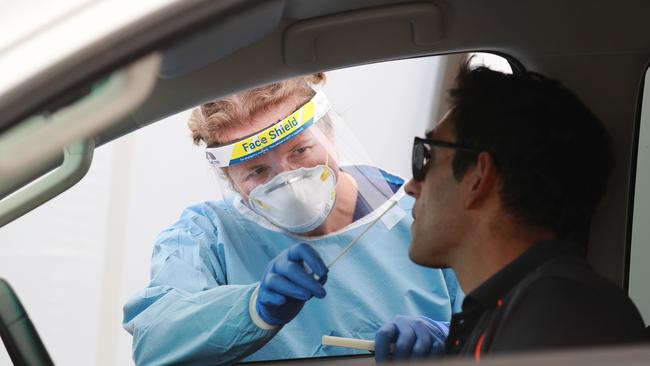 A man is tested for COVID-19 at a drive-through clinic at Bondi in Sydney’s east last week. Picture: John Feder