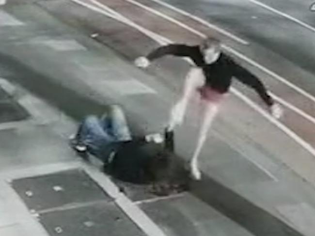 Shocking footage captures the moment father and son crime duo Jared Pihlgren, 53, and Jay Stephens, 23, launch a vicious assault on an innocent stranger on Lonsdale St, Melbourne, about 12.30am on December 17, 2021,