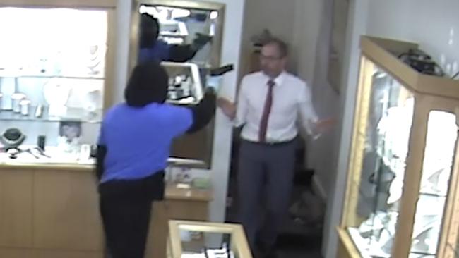 Manager Steve Morrow bravely stood his ground against a gun-wielding bandit..