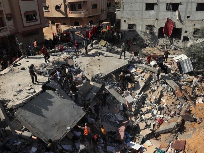 Palestinians check the rubble of an Israeli strike on Rafah, in the southern Gaza Strip amid continuing battles between Israel and Hamas. Picture: AFP