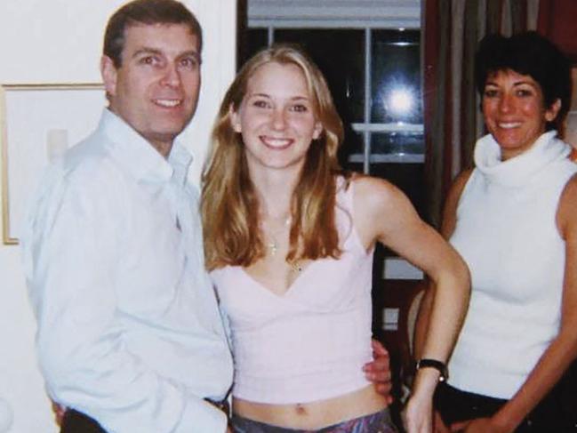 An undated handout photo taken at an undisclosed location and released on August 9, 2021 by the United States District Couty for the Southern District of New York shows (L-R) Prince Andrew, Virginia Giuffre, and Ghislaine Maxwell posing for a photo. - A US judge on January 12, 2022 denied Prince Andrew's plea to dismiss a sexual assault lawsuit brought against the British royal, paving the way for the case to proceed, a court filing showed. (Photo by Handout / US District Court - Southern District of New York (SDNY) / AFP) / RESTRICTED TO EDITORIAL USE - MANDATORY CREDIT "AFP PHOTO / UNITED STATES DISTRICT COURT FOR THE SOUTHERN DISTRICT OF NEW YORK" - NO MARKETING - NO ADVERTISING CAMPAIGNS - DISTRIBUTED AS A SERVICE TO CLIENTS