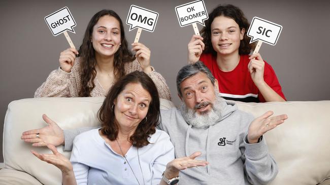 Parents Coralie Higgins and Stephen Camerotto don't understand some of the lingo used by their teens Ella, 16, and Luke, 15. Picture: David Caird