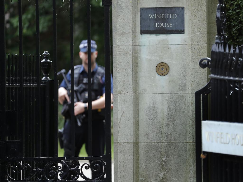 An armed police officer guards the entrance of Winfield House in Regents Park, London, ahead of the State Visit by US President Donald Trump. Picture: AP Photo/Frank Augstein