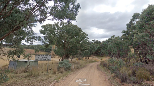 The group stopped near this sign before progressing through the flooded causeway. Picture: Google Maps