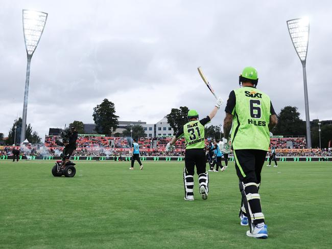 CANBERRA, AUSTRALIA - JANUARY 14:  David Warner and Alex Hales of the Thunder walk out to open the batting during the BBL match between Sydney Thunder and Adelaide Strikers at Manuka Oval, on January 14, 2024, in Canberra, Australia. (Photo by Mark Metcalfe/Getty Images)