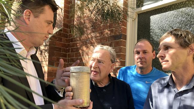 Michael Regan with Ross, Richard and Mark Sterland and the time capsule