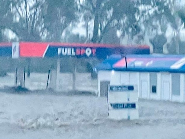 A service station on the Bruce Hwy inundated by floodwaters. Picture: Claytons Towing