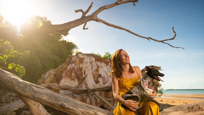 Leah Sanderson is our next candidate for Why I Love the NT. She is pictured here at her favourite beach, Mindil Beach and her pup Kalki. Picture: Che Chorley