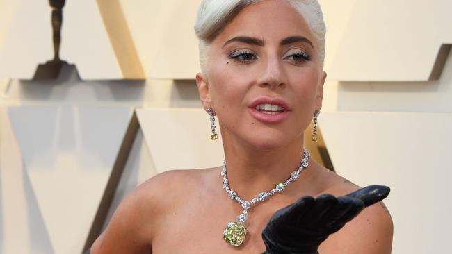 Lady Gaga and her 128.54 carat necklace. Picture: AFP