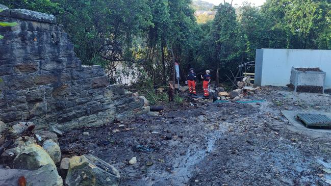 The walkway to Collins Flat Beach at Manly is closed after part of it and a retaining wall were washed away on Friday night. Picture: Manly SES