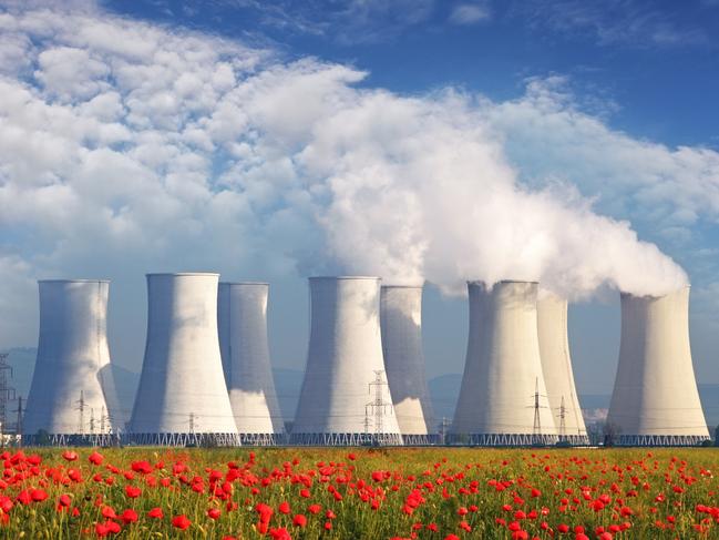 Nuclear Power plant with red field and blue sky
