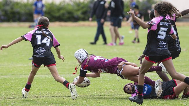 Nevaeh Horswood scores a try for Dalby against Valleys. Picture: Kevin Farmer