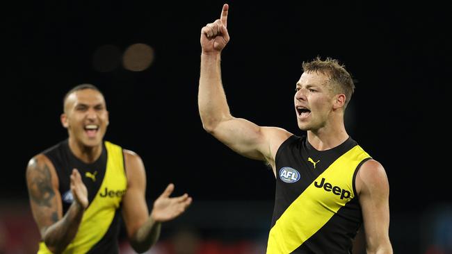 AFL Round 10. Richmond vs Brisbane at Metricon Stadium, Gold Coast.  04/08/2020.  Jake Aarts of the Tigers celebrates his goal in the fourth quarter  . Pic: Michael Klein