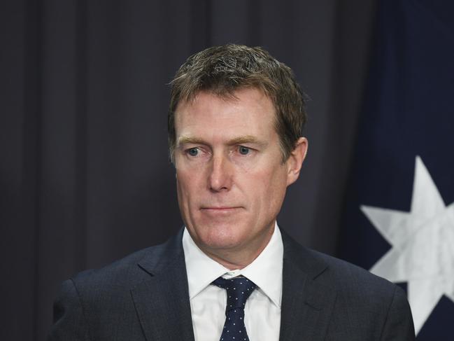 Australian Attorney-General Christian Porter speaks to the media during a press conference at Parliament House in Canberra, Wednesday, May 9, 2018. The Turnbull government is calling for the resignations of four MPs after the High Court disqualified Labor senator Katy Gallagher over her dual citizenship. Attorney-General Christian Porter says therefore it's time for Labor MPs Susan Lamb, Justine Keay and Josh Wilson, as well as independent Rebekha Sharkie to stand down, given their British ancestry. (AAP Image/Lukas Coch) NO ARCHIVING