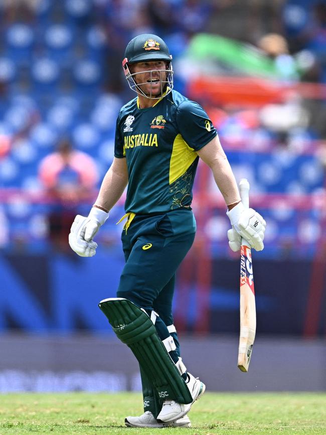 Warner takes one final look at the wicket as he retires from international cricket.