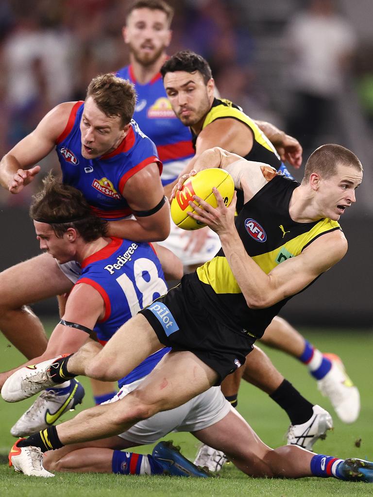 Young Richmond midfielder Thomson Dow works his way out of traffic. Picture: Michael Klein