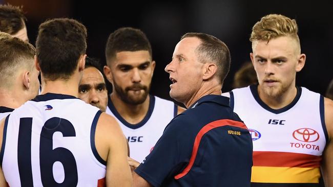 Adelaide Crows coach Don Pyke speaks to his players during the round one AFL match against Essendon. Picture: Quinn Rooney/Getty Images