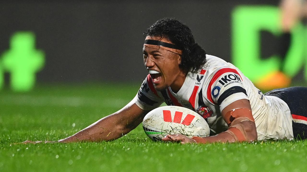 AUCKLAND, NEW ZEALAND - APRIL 30: Sitili Tupouniua of the Roosters dives over to score a try during the round nine NRL match between New Zealand Warriors and Sydney Roosters at Mt Smart Stadium on April 30, 2023 in Auckland, New Zealand. (Photo by Hannah Peters/Getty Images)