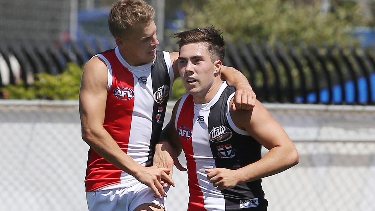 Jack Lonie and Jade Gresham celebrate a goal during the win over North Melbourne. Picture: Michael Klein