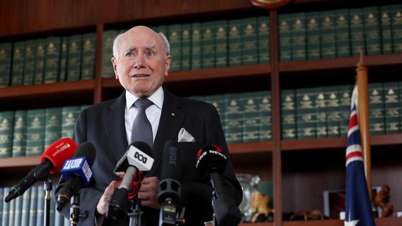 Former Prime Minister John Howard is pictured talking to media at his office in the Sydney CBD about the Queen and his memories of her. Picture: NCA NewsWire / Damian Shaw