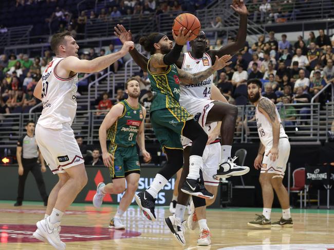 Jordon Crawford drives to the basket under pressure from Sunday Dech of the 36ers during the NBL Blitz match on September 21, 2023 on the Gold Coast. Picture: Russell Freeman/Getty Images for NBL