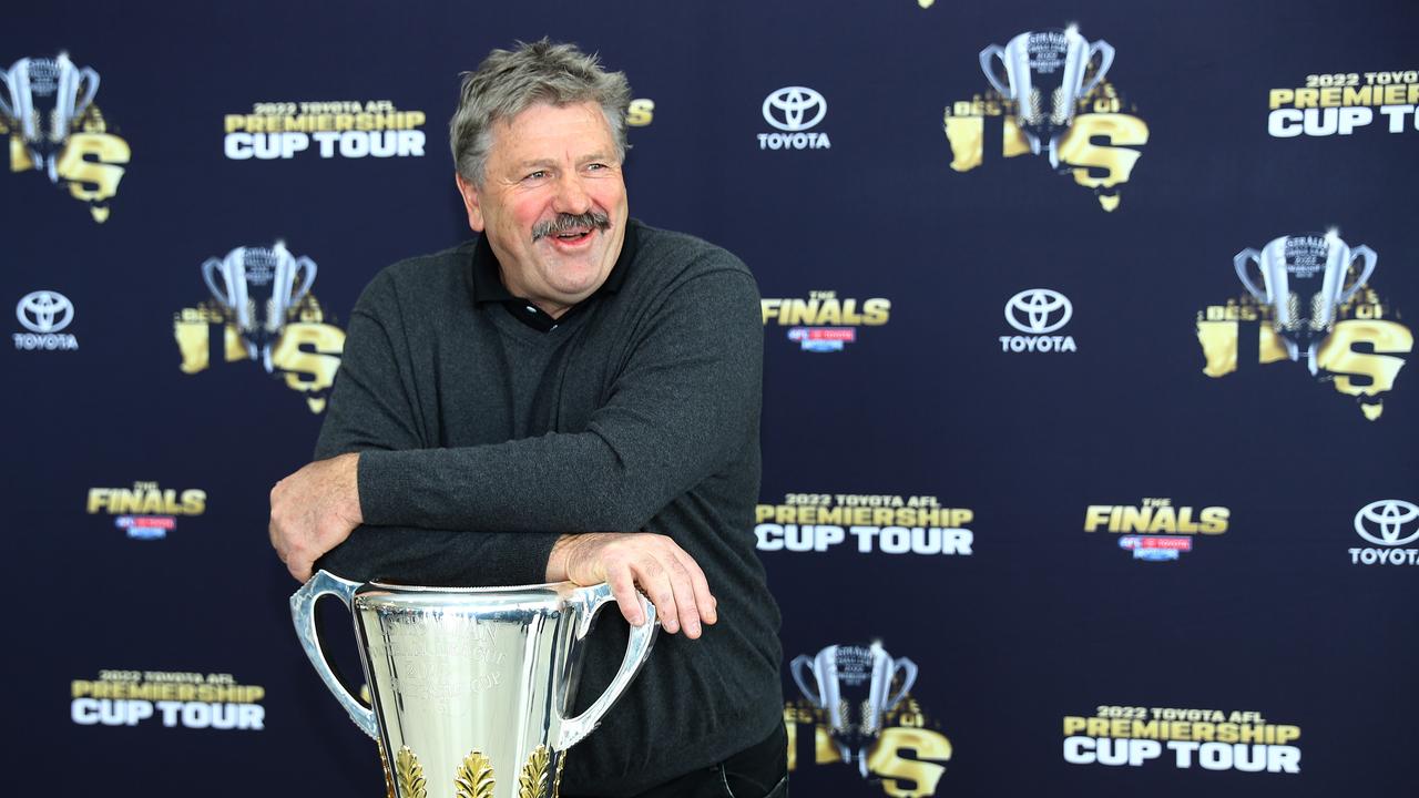 Broadcaster Brian Taylor with the 2022 Premiership Cup. Picture: Alison Wynd