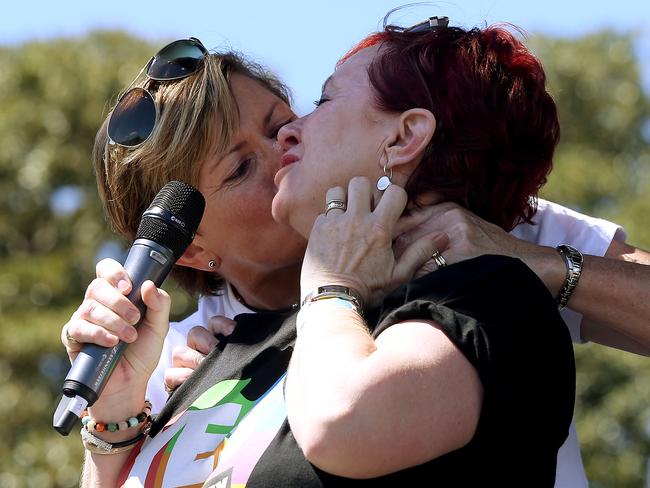 Tony Abbott's sister Christine Forster kisses her partner Virginia Edwards after the Yes announcement. Picture: Toby Zerna