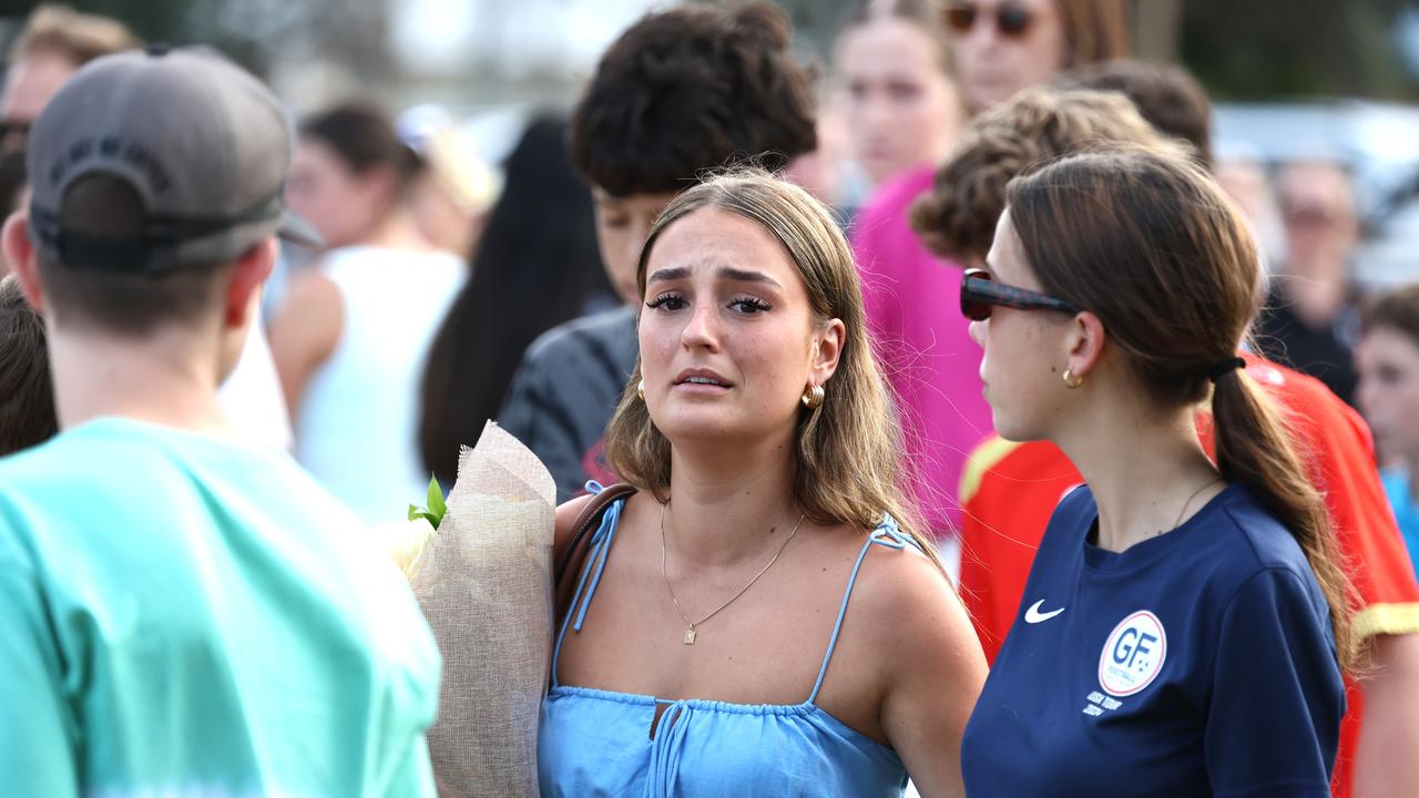 Hundreds of people have gathered at Bribie Island for a vigil to honour 17-year-old shark attack victim Charlize Zmuda. Picture: David Clark