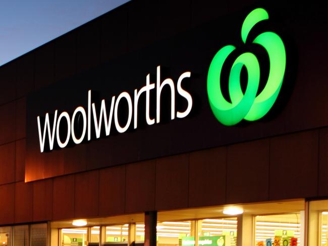 Mount Gambier, South Australia, Australia - June 6, 2015: Woolworths Store at Commercial Road East Mt Gambier. Customers arrive at the Store to Shop in the Early Evening. Woolworths is the Largest Australian Owned and Operated Supermarket/Grocery Chain in Australia, with over 933 stores throughout Australia.