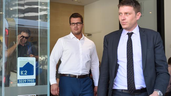 Gable Tostee walks with his lawyer Nick Dore (right) to the Supreme Court in Brisbane. Picture: AAP Image/Dave Hunt