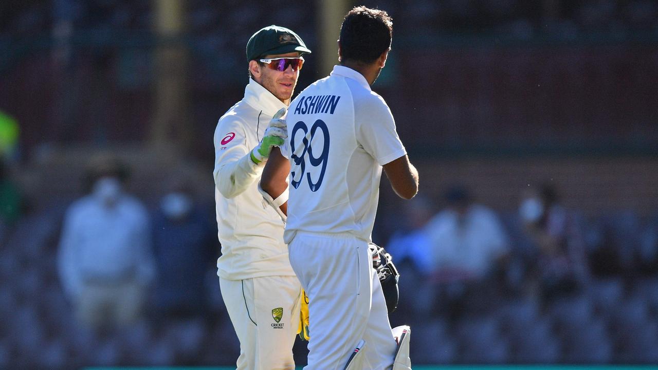 Australia's captain Tim Paine and Indian spinner Ravichandran Ashwin.