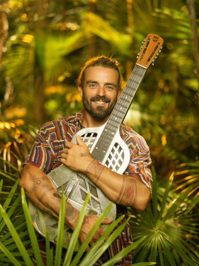 Xavier Rudd at home with a favourite guitar, ahead of his 2023 European tour. Picture: Glenn Hunt