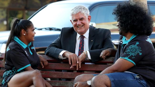 Terrani Jack, 23, and Tomzarni Dann, 32, talk to ken Wyatt during campaigning in his Perth seat of Hasluck. Picture: Colin Murty