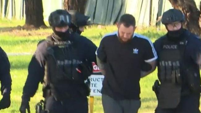 Mr Hogg was arrested after a tense stand-off with police. Picture: Channel 9.