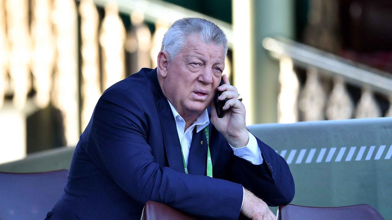 Phil Gould on the phone signing up some more Panthers players.