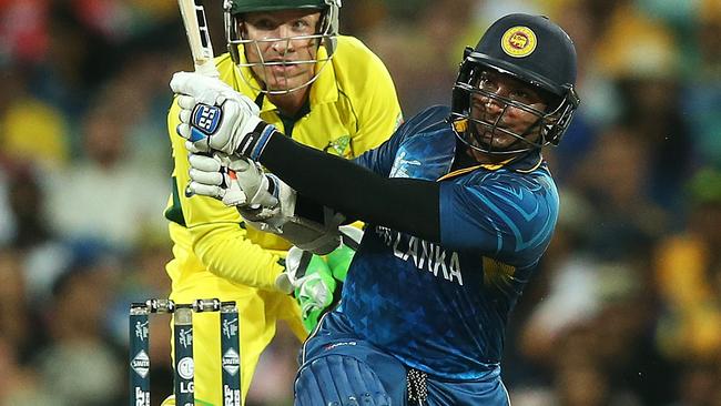 Sri Lanka's Kumar Sangakkara smashes a boundary during ICC Cricket World Cup match between Australia and Sri Lanka at the SCG. pic. Phil Hillyard